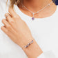 Pulseira corrente elo português em prata 925 polida (clara), com pedras ametista lavanda, pérolas e ametista. Comprimento: regulagem entre 15cm e 18cm. Para outras medidas entre em contato. Embalagem em envelope de tecido, com cartão postal Amor Maior. Esta é uma joia de prata 925 produzida com uma liga conhecida internacionalmente com STERLING SILVER – 925, o que significa que ela é constituída de 92,5% de prata pura, garantindo a qualidade do material utilizado. Por se tratar de pedras naturais, podem apr