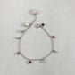 Pulseira corrente elo português aberto em prata 925 polida (clara), com pingentes em pedras quartzo rosa, pérola lilás, granada, quartzo cereja e rodocrosita. Comprimento: regulagem entre 15cm e 18cm. Para outras medidas entre em contato. Embalagem em envelope de tecido, com cartão postal Amor Maior. Esta é uma joia de prata 925 produzida com uma liga conhecida internacionalmente com STERLING SILVER – 925, o que significa que ela é constituída de 92,5% de prata pura, garantindo a qualidade do material utili