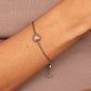 Pulseira corrente cartier redonda prata 925 polida (clara) e oxidada (escura), com pingentes em pedras coração rodocrosita, quartzo cereja e pérolas rosa. Comprimento: regulagem entre 15cm e 18cm. Para outras medidas entre em contato. Embalagem em envelope de tecido, com cartão postal Amor Maior. Esta é uma joia de prata 925 produzida com uma liga conhecida internacionalmente com STERLING SILVER – 925, o que significa que ela é constituída de 92,5% de prata pura, garantindo a qualidade do material utilizado